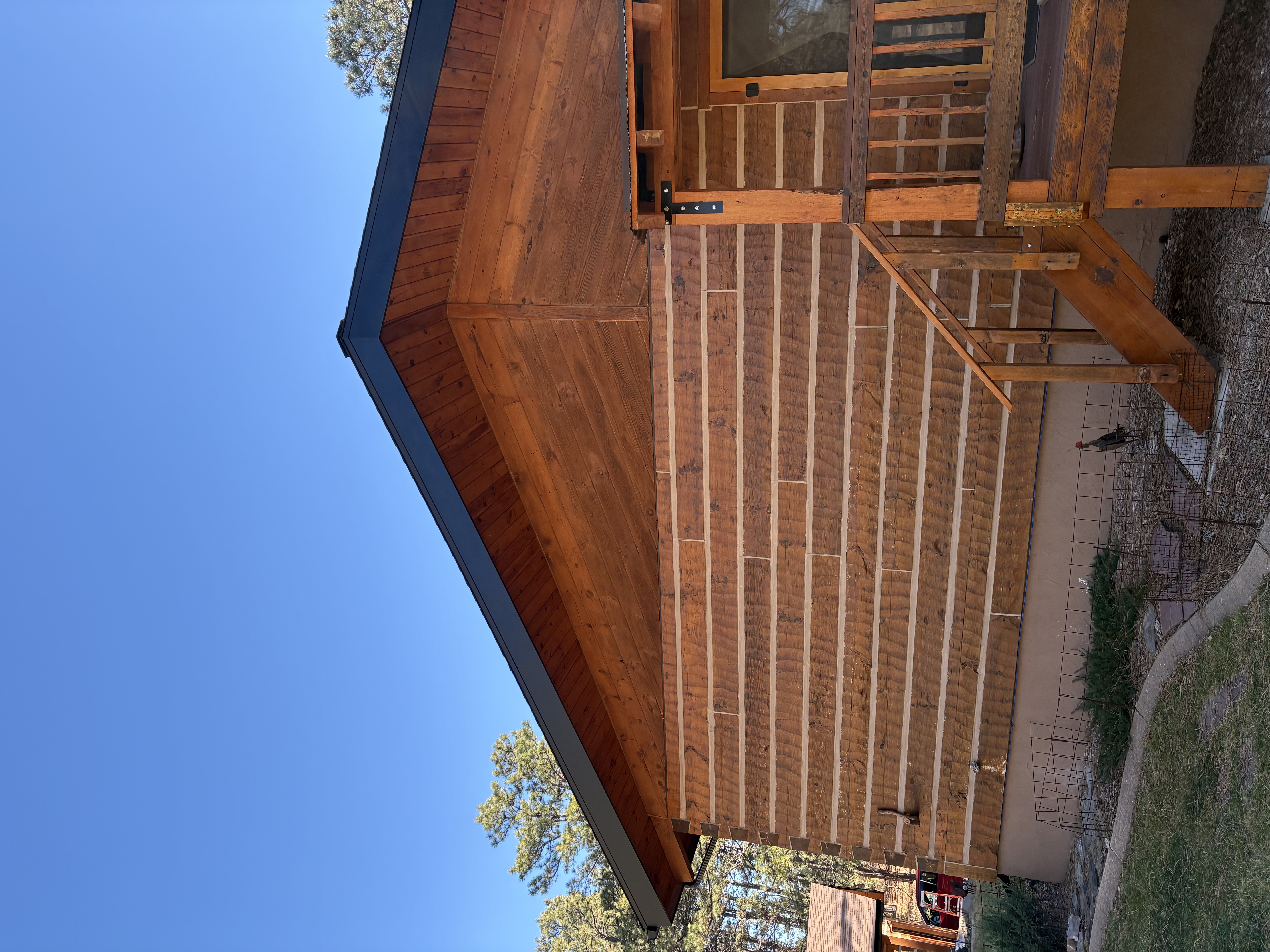 Cabin exterior with railings and metal details